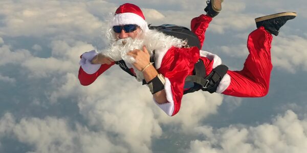 Skydiving Santa Image used to highlight Holiday Sale